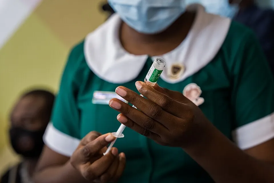 A nurse preparing a vaccine